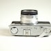 Vintage Minolta Hi-Matic 7S 1960s Rangefinder with base case and strap prop decor 35mm made in japan snapshots amazing photos