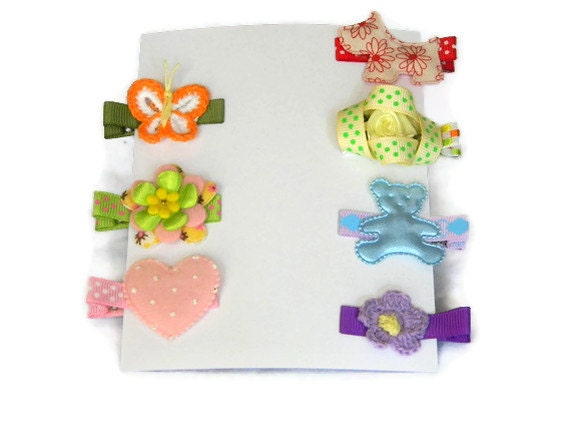 Girls Hair Clips Set of (7) in Red, Yellow, Green, Blue, Purple, and Pink on Lined Alligator Clips