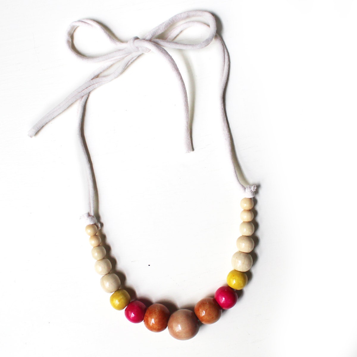 Color Pop Necklace in Hazelnut, Bubblegum, Lemon & Cream . Non-toxic Beads with a Jersey Tie . Fashionable and baby-friendly
