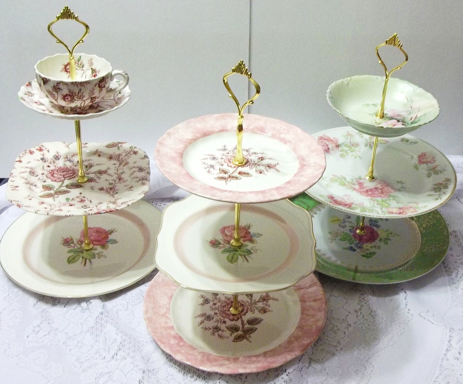 Entertaining With Coming Up Roses Is A Three Tier Serving Stand With Antique Dishes for the Wedding Sweet Table