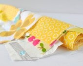 Quilting cotton fabric designer scrap roll yellow tones.