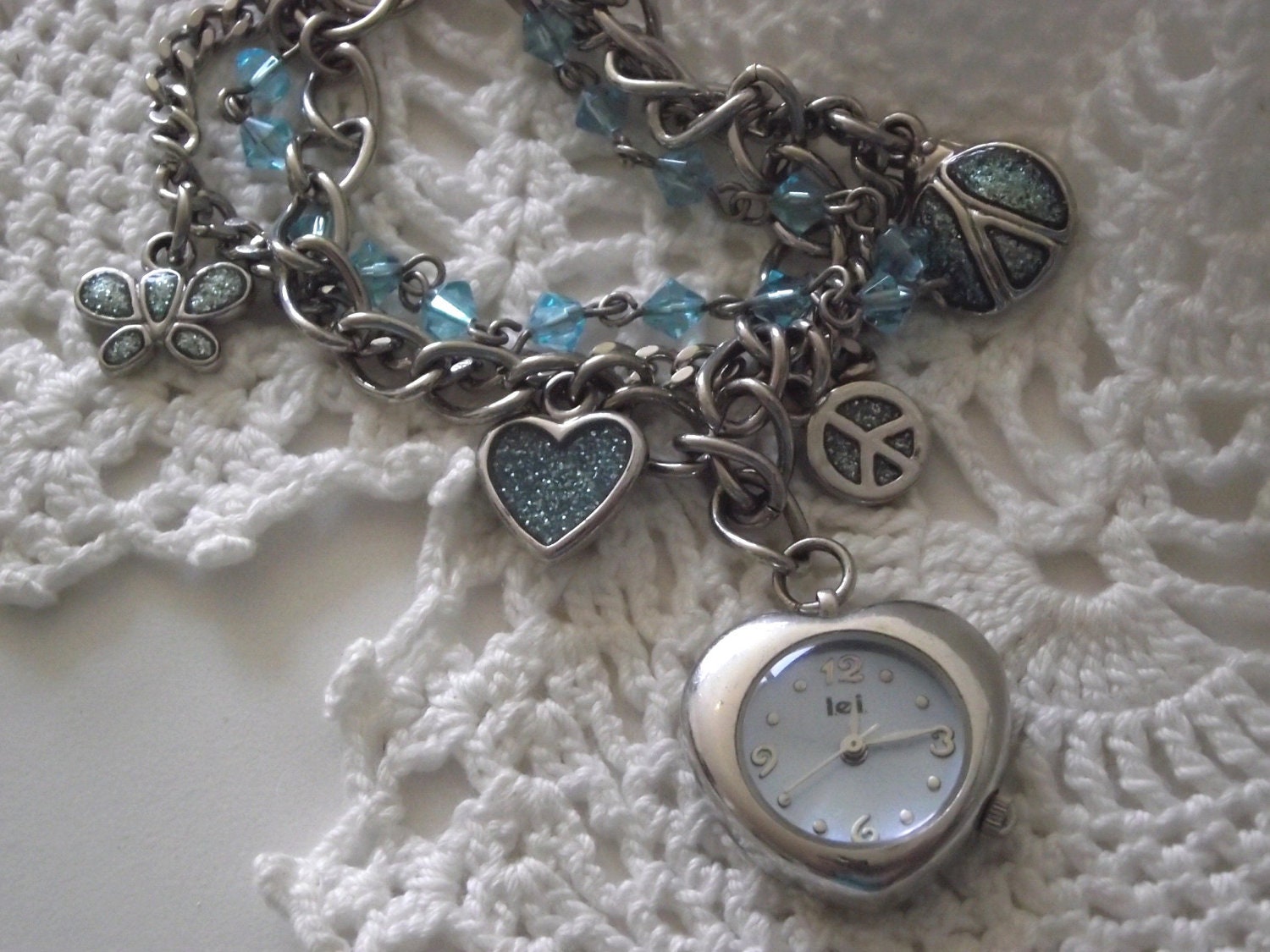 Vintage charm bracelet with watch peace symbols & blue beads