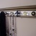 Necklace / jewelry organizer with 11 copper and black decorative cabinet knobs on metallic bronze EXTRA LONG 30 inches long