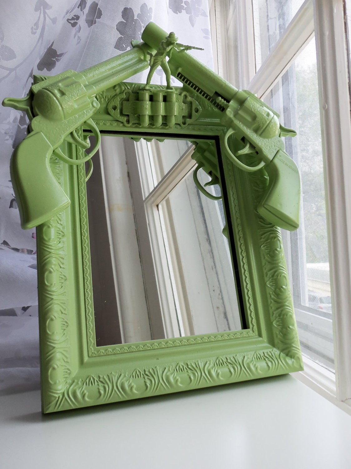 green cowboy gun mirror