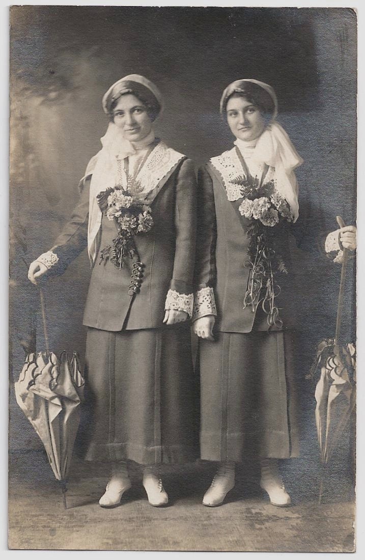 Old Photo Postcard Women wearing Same Outfit Flowers Parasol Umbrellas Lace Cuff and Collar Photograph vintage
