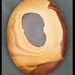 Wonderstone cabochon 40mm x 32mm x 6mm thick at 10.9 grams