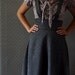 1918 -- a strappy jumper size x small