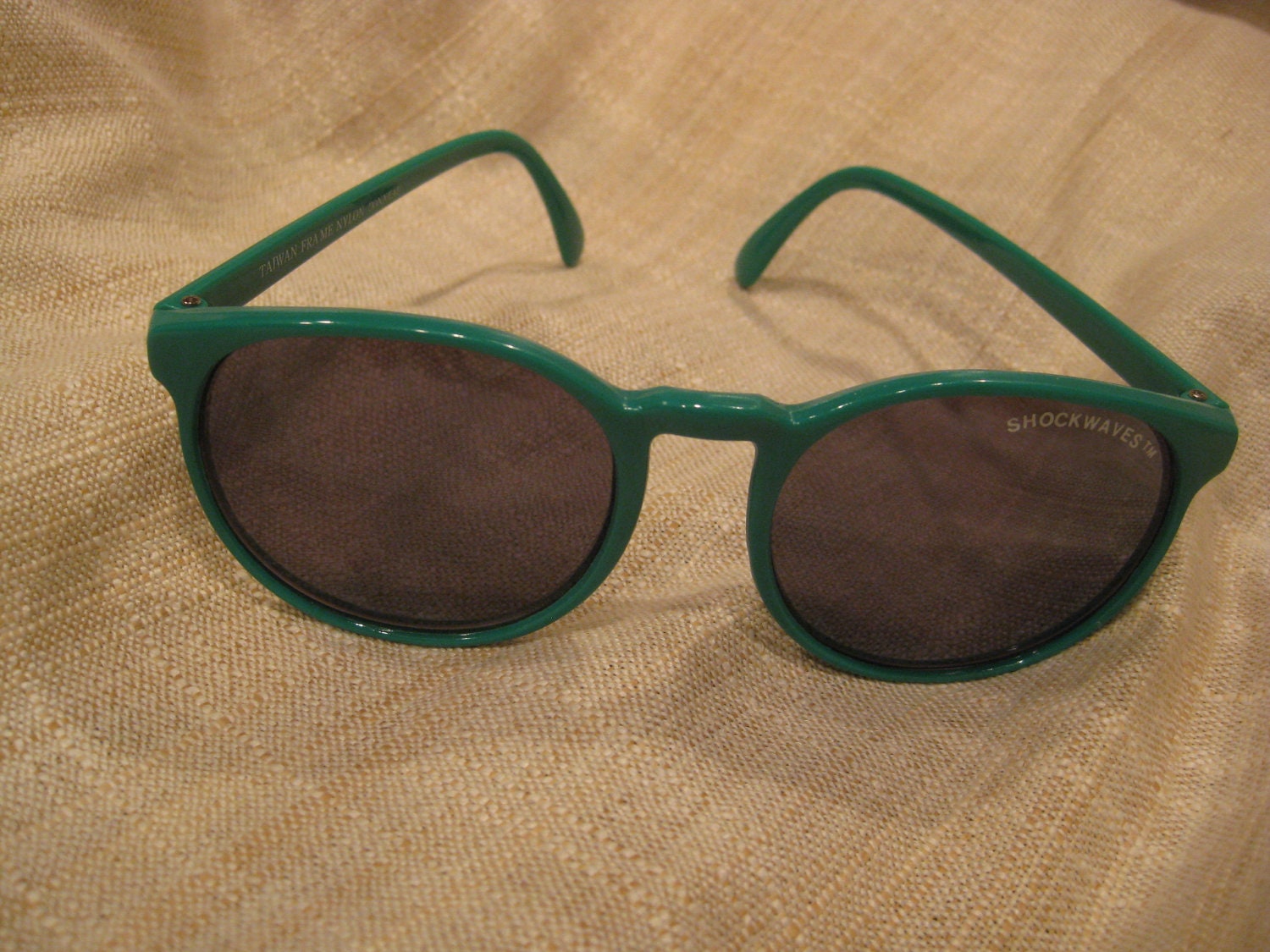 SHOCKWAVES sunglasses green plastic frames very nice condition.... big, cool, 80s style