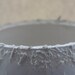 Unusual earthenware bowl with a unique textured rim.