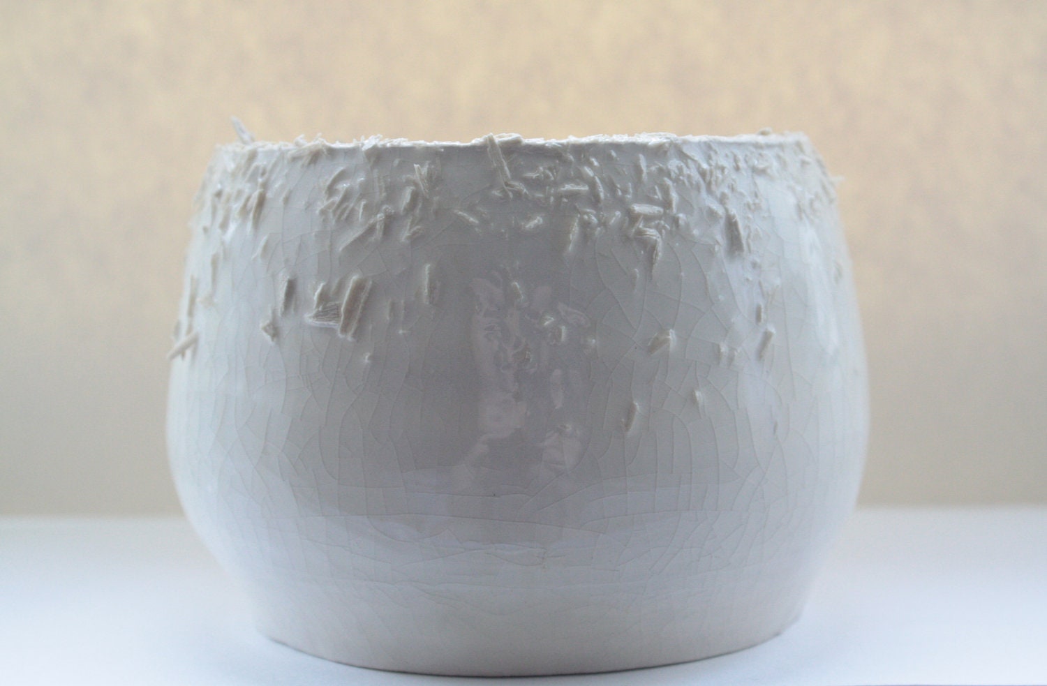 Unusual earthenware bowl with a unique textured rim.