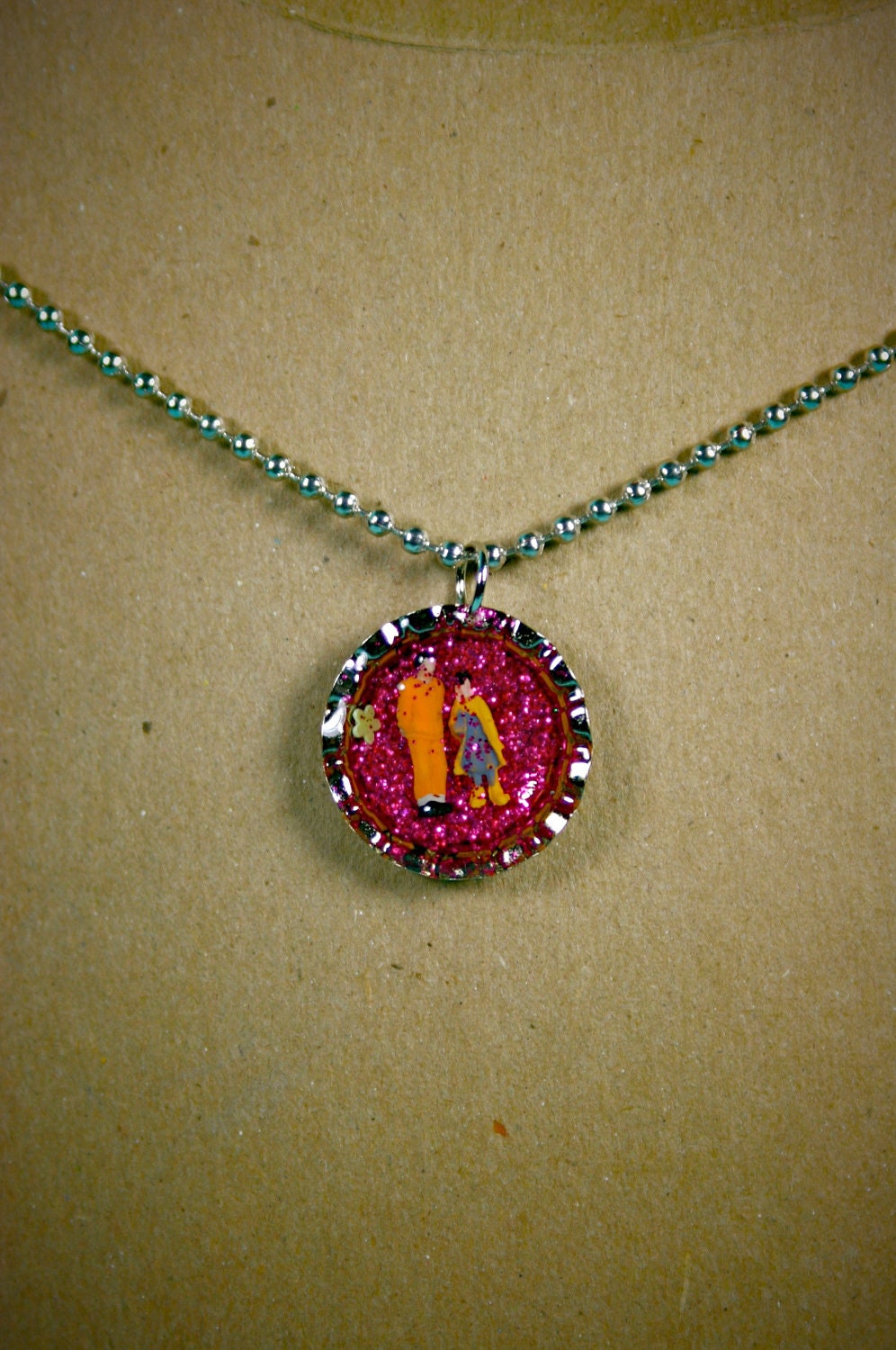 Conjugal Visit Necklace with Pink Glitter Backdrop