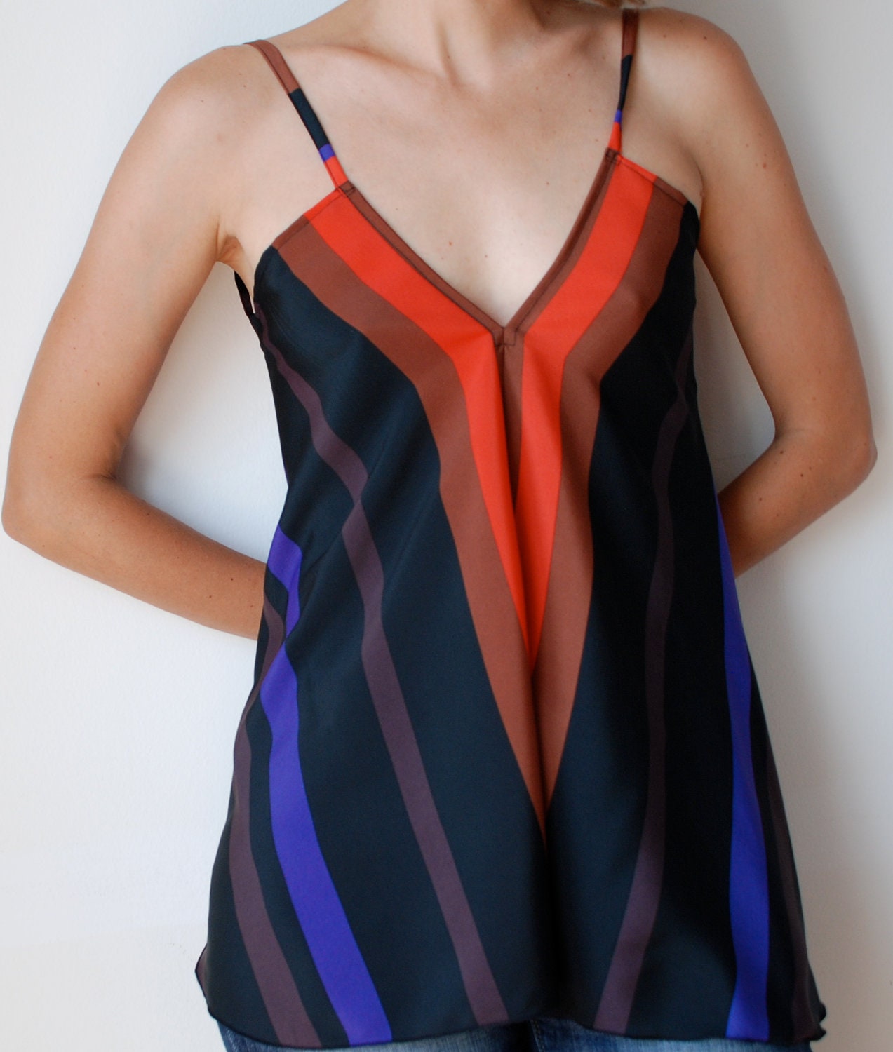 Striped pure silk top. Bias cut. V front V back. Black, orange, purple, brown. Adjustable straps. One size fits many.