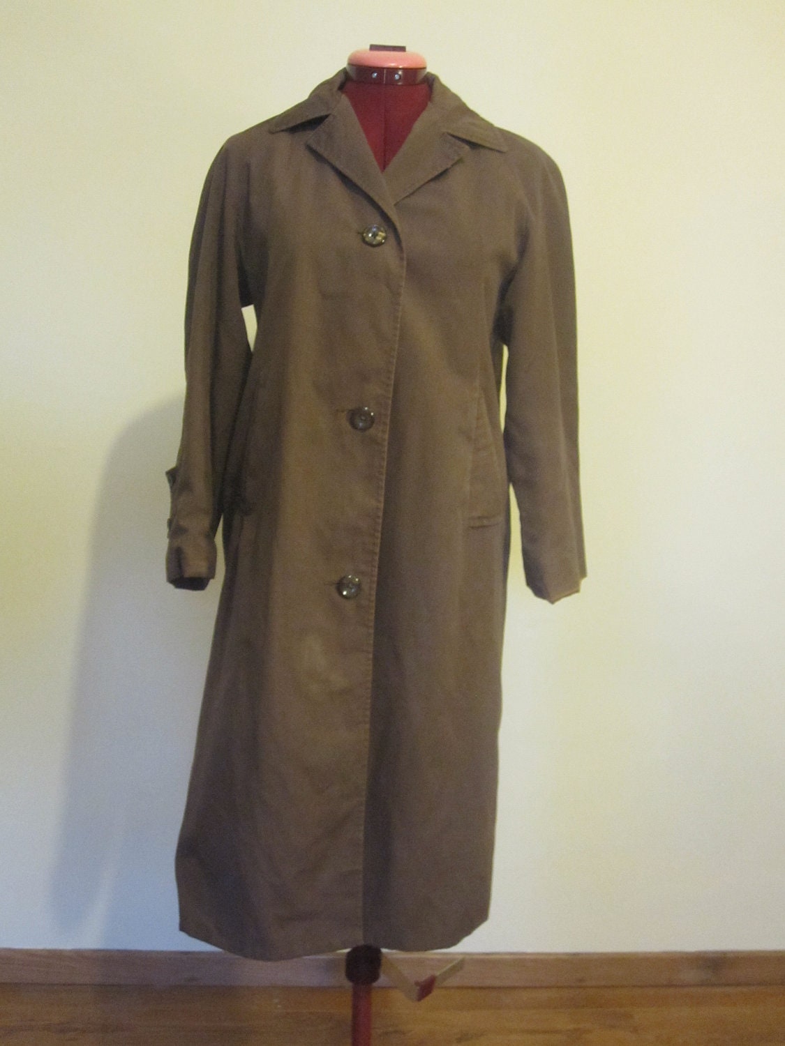 Vintage 1970s brown Peter Jones trench coat.