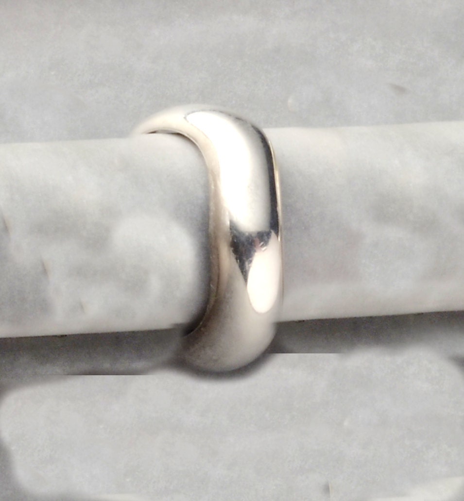 Small Curved shiny sterling ring.  One of the styles that is a perfect fit.