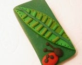 Ladybug and Leaf Pin OR Magnet - handmade polymer clay jewelry or home decor