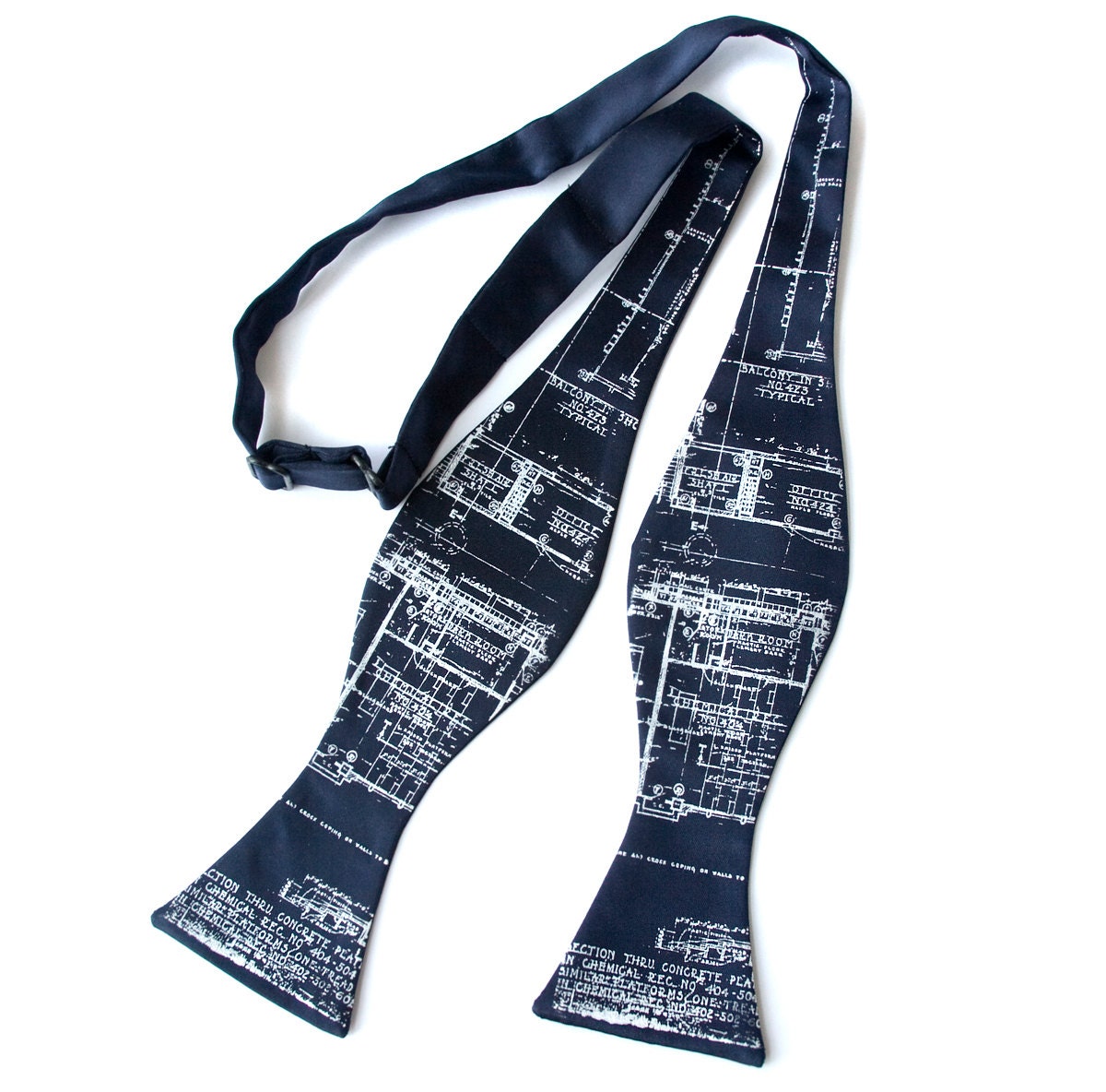 Navy blue blueprint bow tie. Ivory-cream screenprinted design. Freestyle men's bowtie. Adjustable.