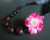 SALE . cherrywood . hot pink and black knotted wood bead necklace