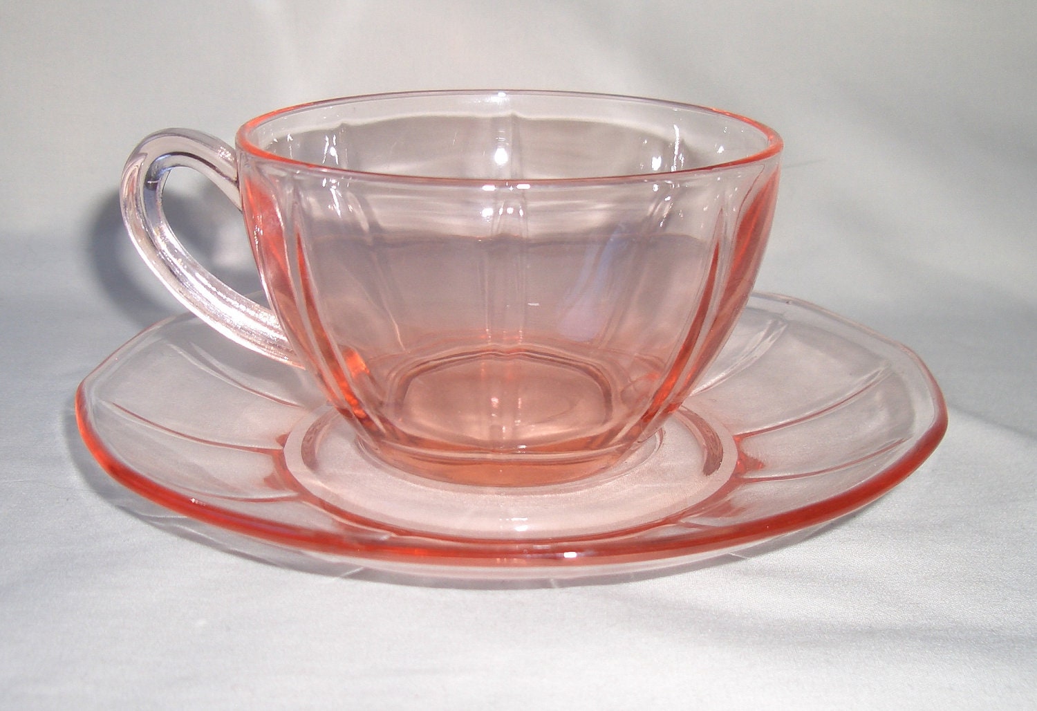 vintage pink depression glass teacup and saucer set by dreamy1 vintage pink depression glass teacup and saucer set by dreamy1