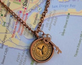 New York City subway Token with key necklace