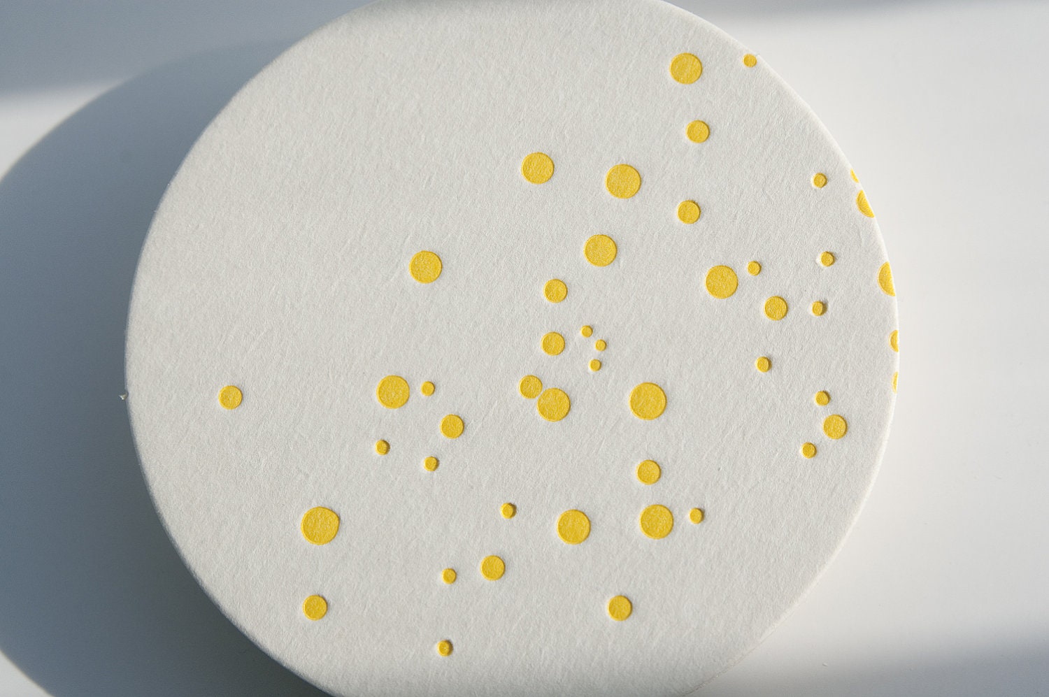 festive yellow confetti holiday  letterpress coasters, set of 8