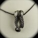 SALE - Wisdom Tooth Tentacle Pendant by OctopusME