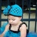 Crocheted Beanie with Frilly Loopy Flower Hot Blue, Black Trim Flowered Beanie Open Weave Design