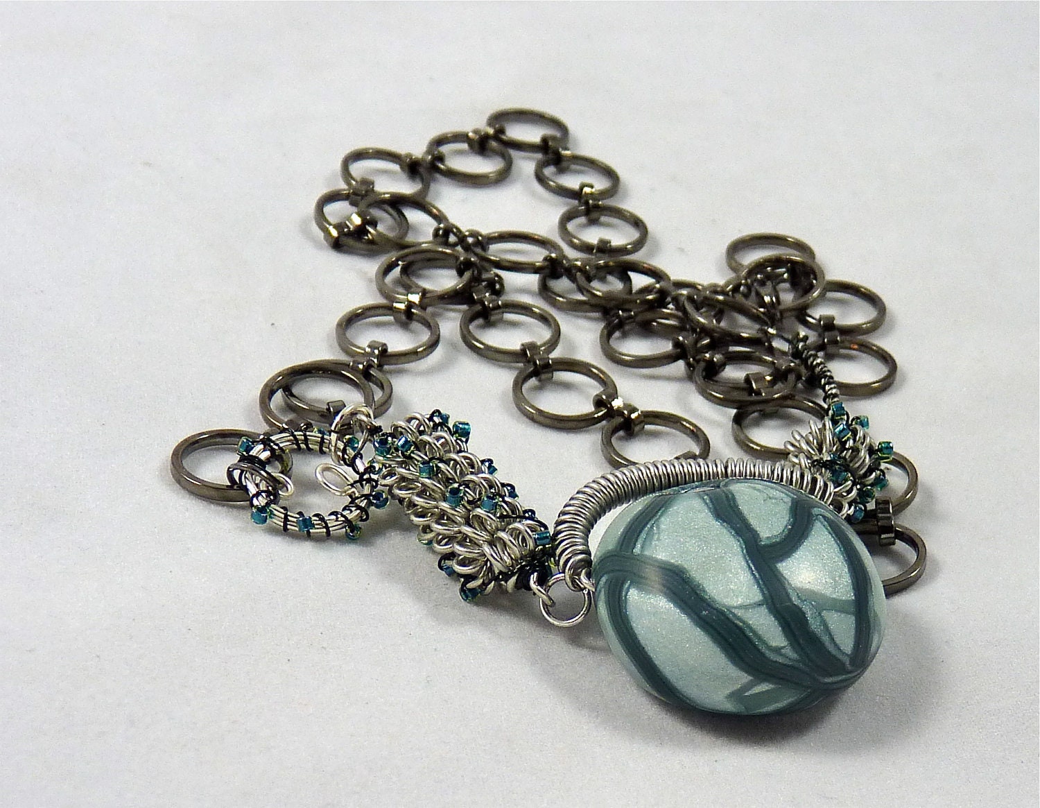 Gorgeous Teal Polymer Clay Bead and Silver  Wirework Necklace on Gun Metal Gray Chain