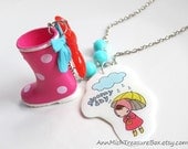 Gloomy Day. Retro Pink rain boots with red ribbon bow, blue glass beads and resin pendant with swarovski crystal