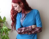 blue long sleeve thermal shirt with with plaid cuff
