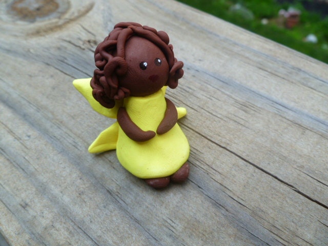 Mini Fairy in Yellow with Dark Skin and Brown Hair in Medium Curly Style
