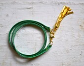 emerald green genuine leather triple wrap bracelet with gold tassel