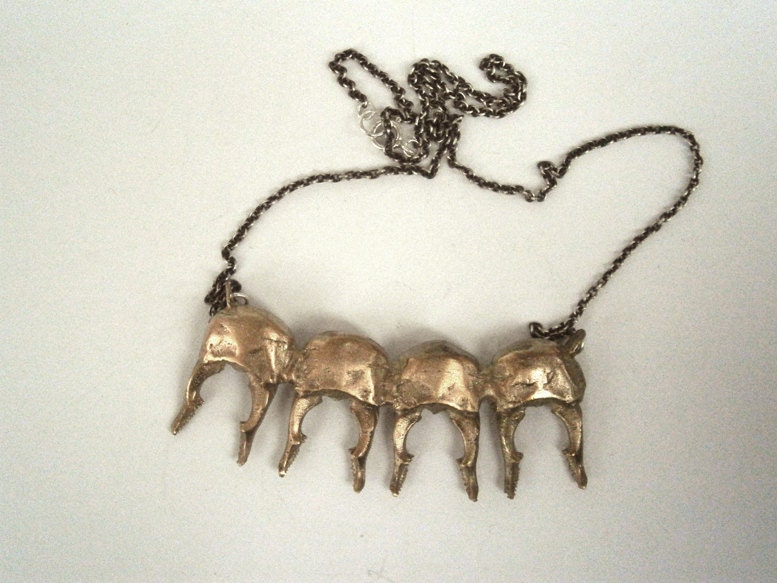 4 beetle heads - bronze - necklace