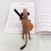 Meerkat with knitted acoustic guitar, guitarist meerkat, meercat guitarist, meerkat musician