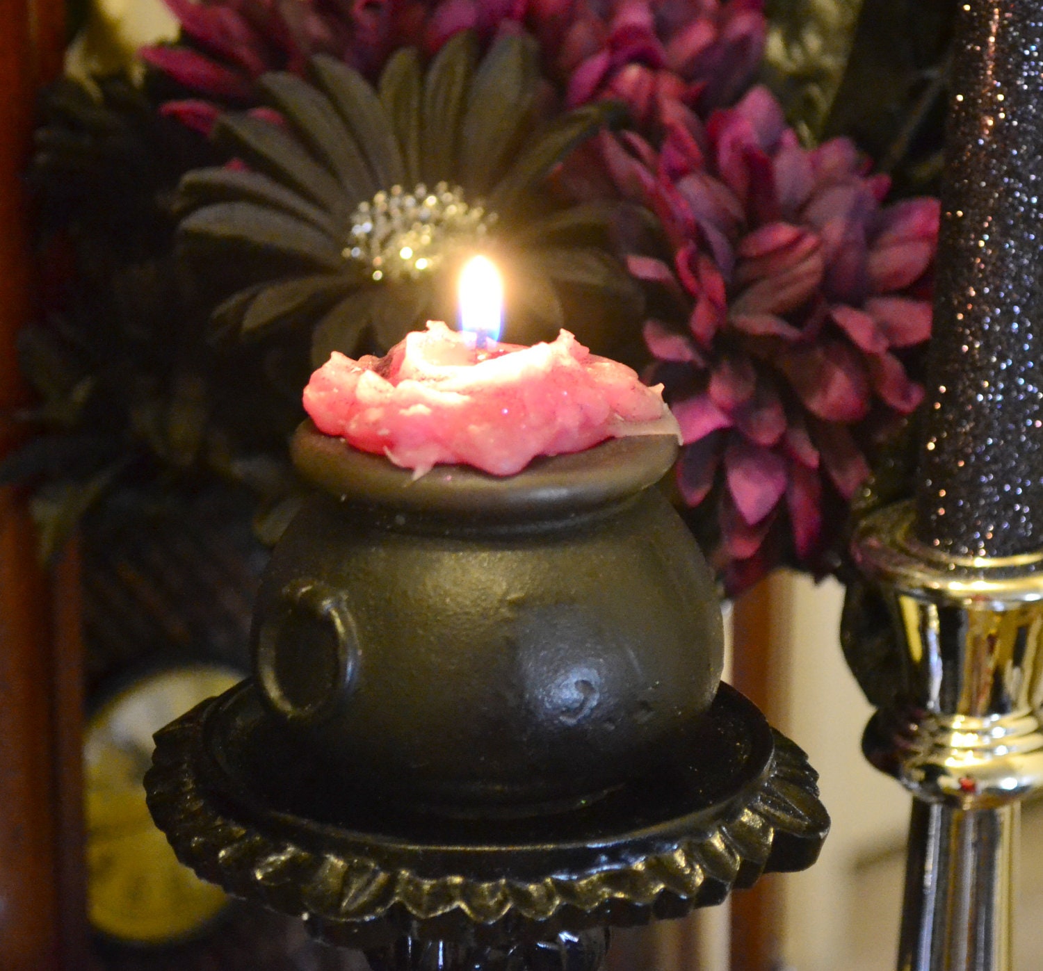 Witches cauldron candle scented in berry bewitching brew Halloween party or home decoration