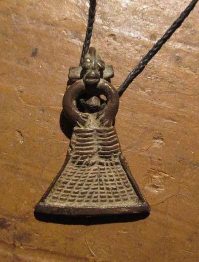 19th Century African Bobo Bronze Figural Pendant Protection Amulet with Eye Beads
