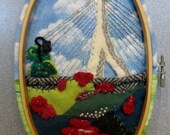 Fiber Art Wall Hanging in an oval hoop - the Zakim Bridge in Boston