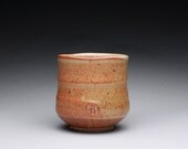 handmade pottery cup, teacup, tumbler with orange shino glazes