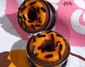 3/4" Donut Eyelets - CLEARANCE - Halloween Chocolate Donut Plugs with Orange Frosting
