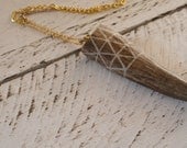Upcycled triangular pattern engraved antler necklace