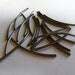 Bead, gunmetal-plated brass, 45x2mm curved tube. Sold per pkg of 20.