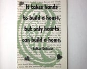 Housewarming print on a book page, it takes hands to build a house but only hearts can build a home