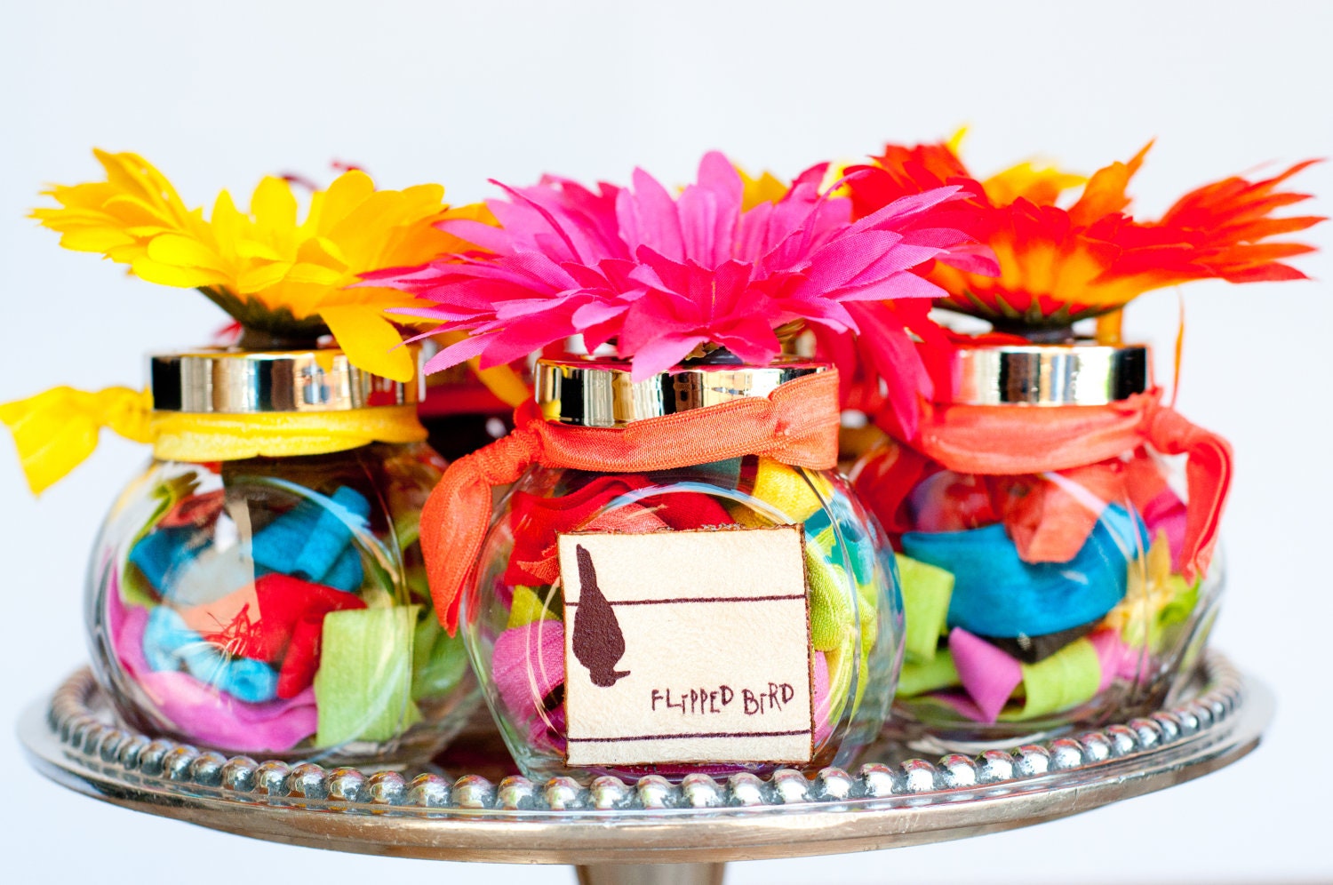 Flipped Bird Flower Jar stuffed with stretchy hair ties, perfect for party favor, birthday gift, hostess gift, cute decoration