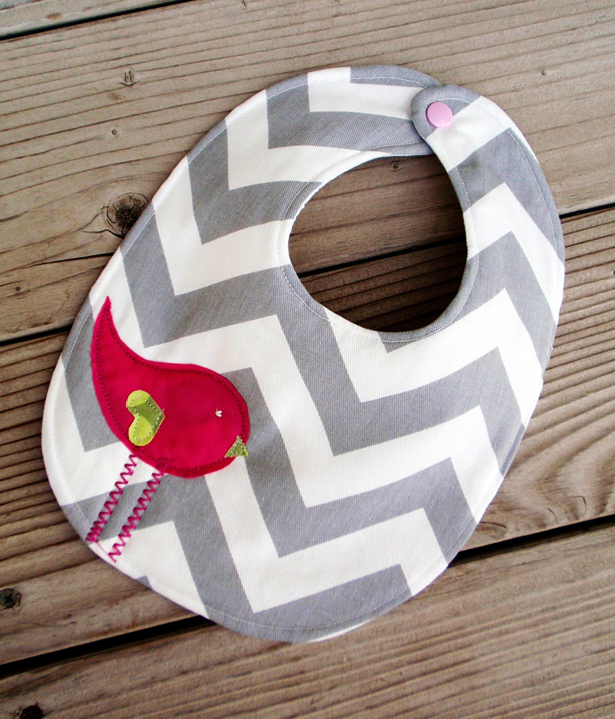 Grey chevron bib with pink bird