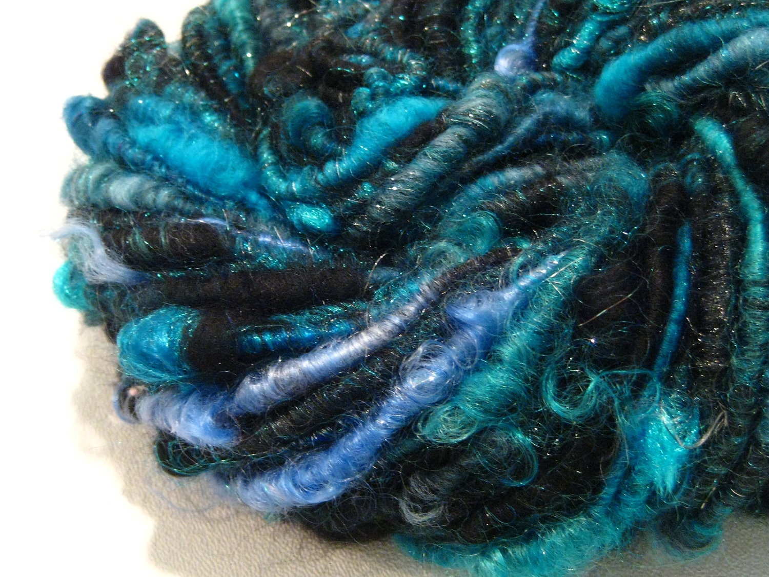 handspun sparkly corespun art yarn Blue Midnight 50 yds turquoise blue black handspun yarn merino wool