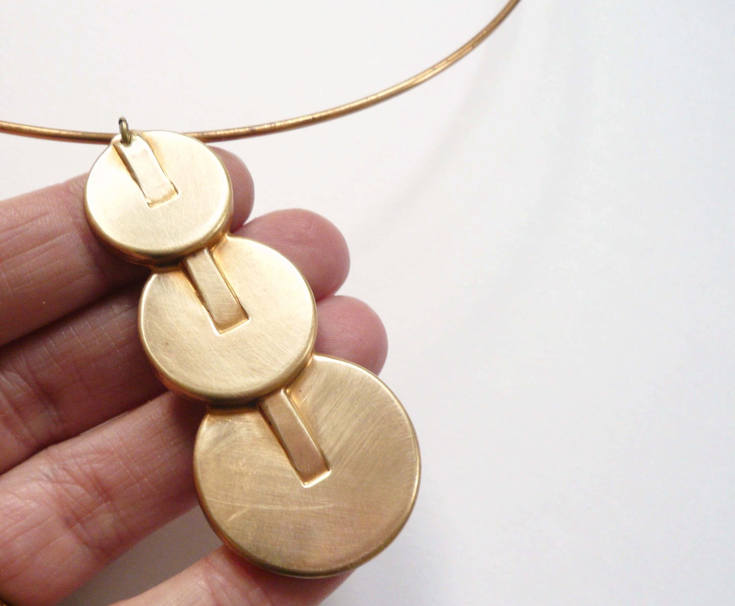 Statement Deco necklace choker. Large vintage cascading deco brass coins on vintage wire choker.