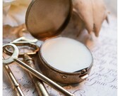 solid perfume in round brass compact - over 60 natural aroma options - the concubine's charm - high victorian kink at its romantic finest