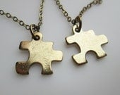 Small Puzzle Piece Necklaces. His and Hers Couple Necklaces in Antique Gold Finish.
