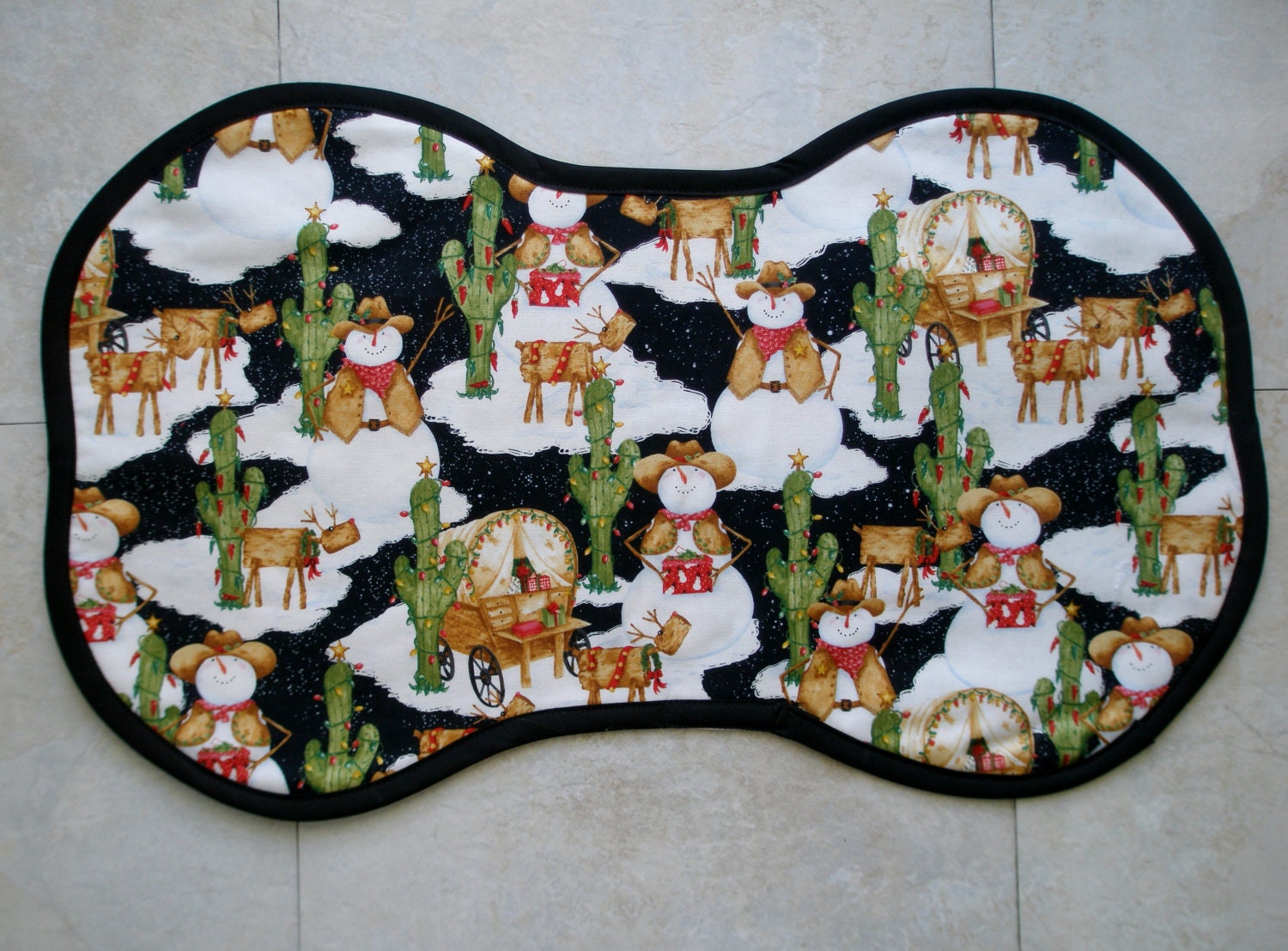 Southwestern Snowman print bone shaped pet placemat