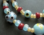 Evil Eye Viking Necklace. Cascade Necklace in Light Blue and Brick Red (18-inches) - Historical Reenactment Jewelry.