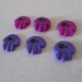 Wonky Eyed Skull flatbacks - purple mix